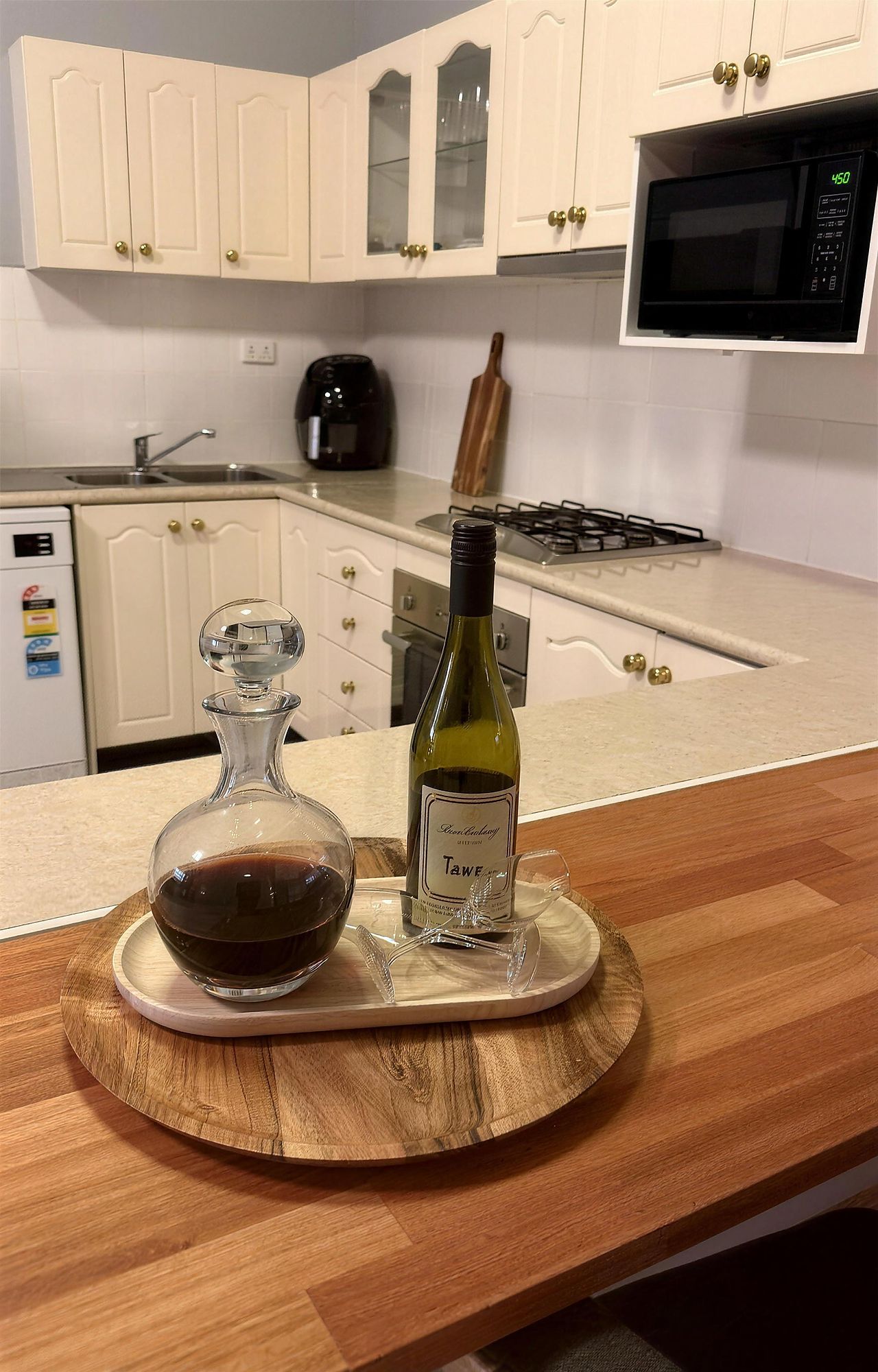 Full kitchen with timber benchtop